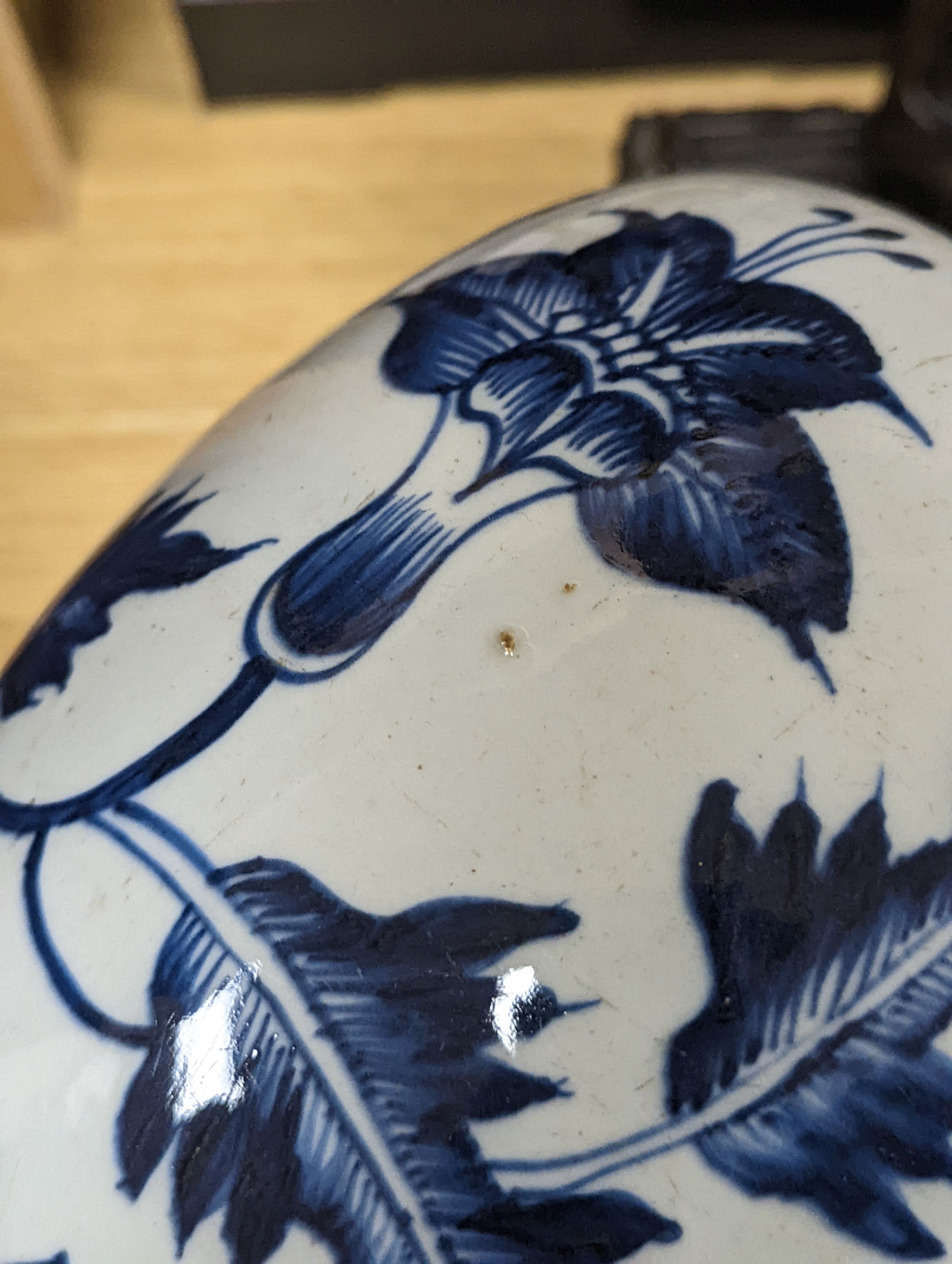 A 18th/19th century Chinese blue and white jar and wood cover - 22cm high